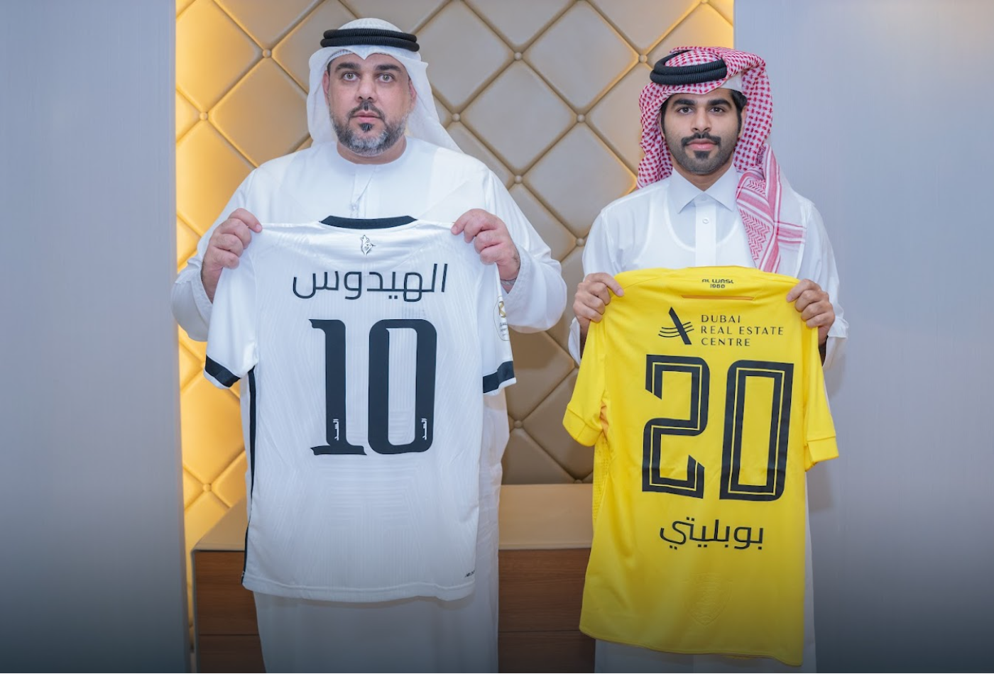 Al Wasl plays with  yellow jersey against Al Sadd of Qatar